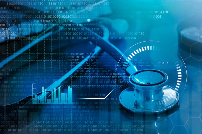 Stethoscope on a reflective surface with digital charts and data overlays suggesting healthcare analytics.